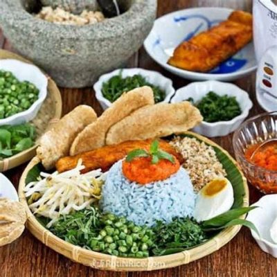  Nasi Kerabu: Een explosie van frisse kruiden en rijke kokosolie-smaken!